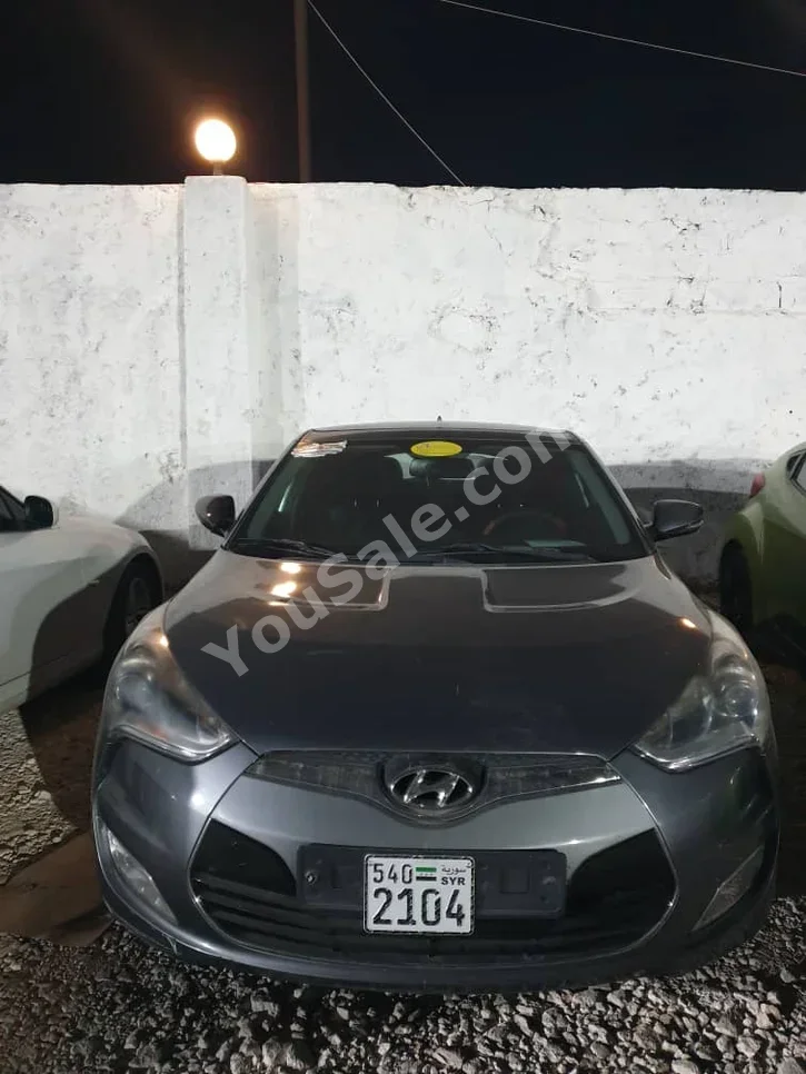 Hyundai  Veloster  2011  Automatic  192,000 km  4 Cylinder  FWD  Coupe / Sport  Dark Gray  Gasoline