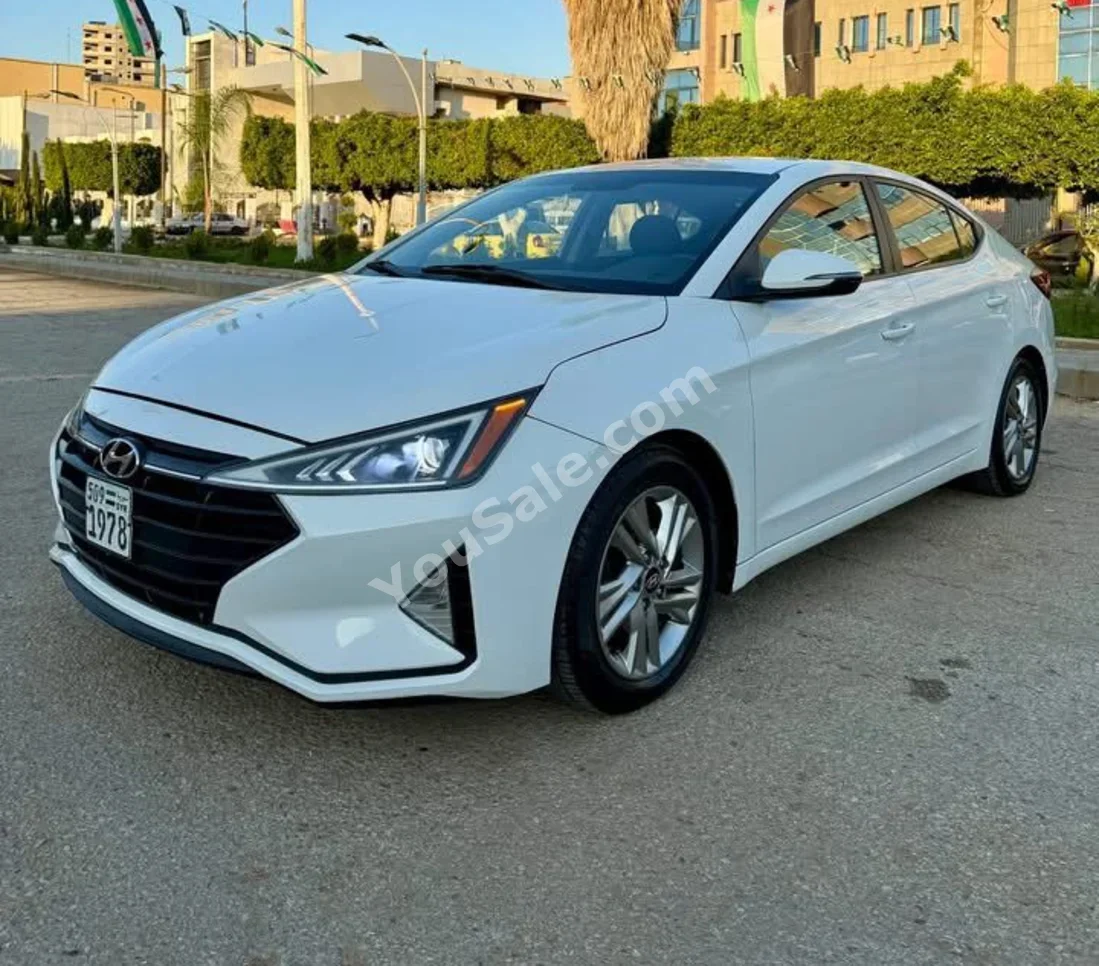 Hyundai  Avante  2019  Automatic  119,000 km  4 Cylinder  FWD  Sedan  White  Gasoline