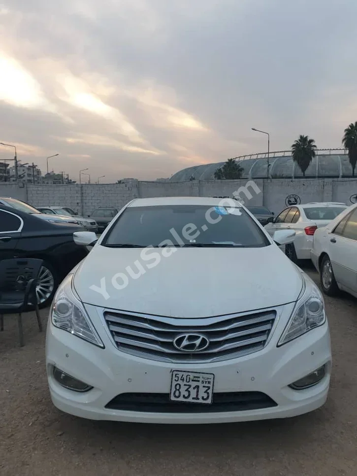 Hyundai Grandeur 2014 Automatic 140,000 km 4 Cylinder FWD Sedan White Gasoline