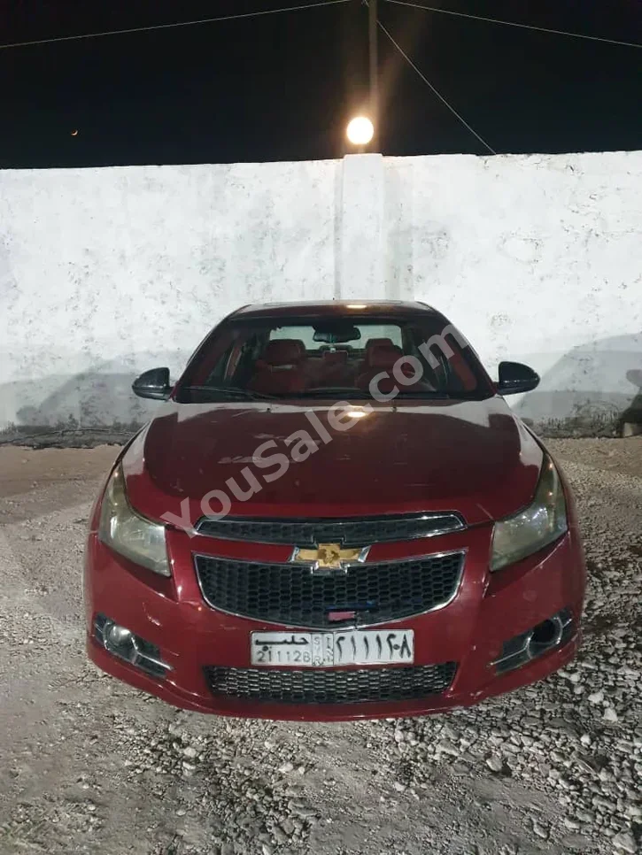 شفروليه كـروز 2006 اتوماتيك 162,000 كم 4 سلندر دفع أمامي سيدان أحمر بنزين