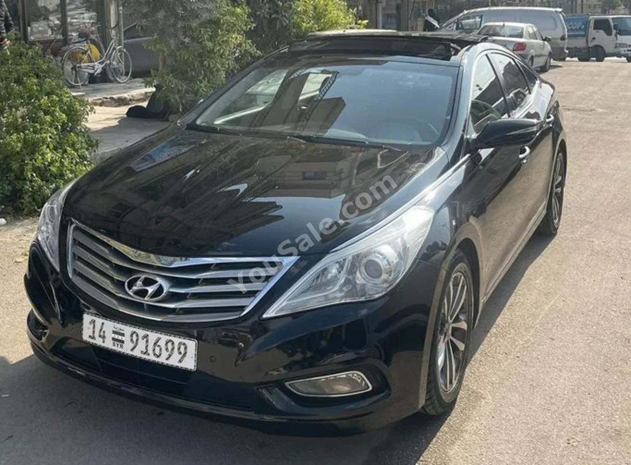 Hyundai Azera 2011 Automatic 92,000 km 4 Cylinder FWD Sedan Black Gasoline