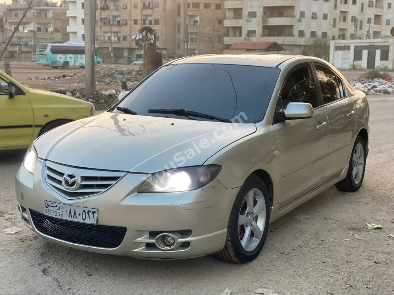 Mazda Mazda 3 2006 Automatic 176,000 km 4 Cylinder FWD Sedan Gold Gasoline