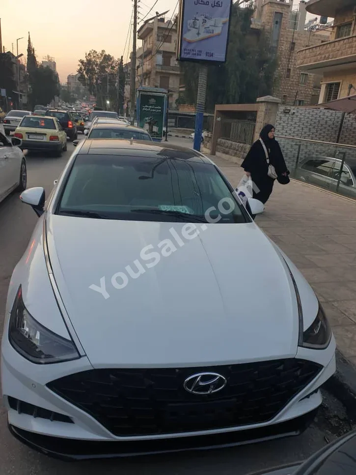 Hyundai  Sonata  2023  Automatic  3,580 km  4 Cylinder  FWD  Sedan  White  Gasoline