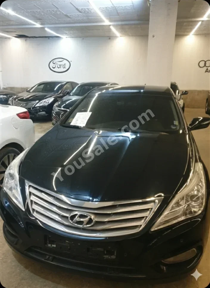هيونداي غراندير 2012 اتوماتيك 115,000 كم 4 سلندر دفع أمامي سيدان أسود بنزين