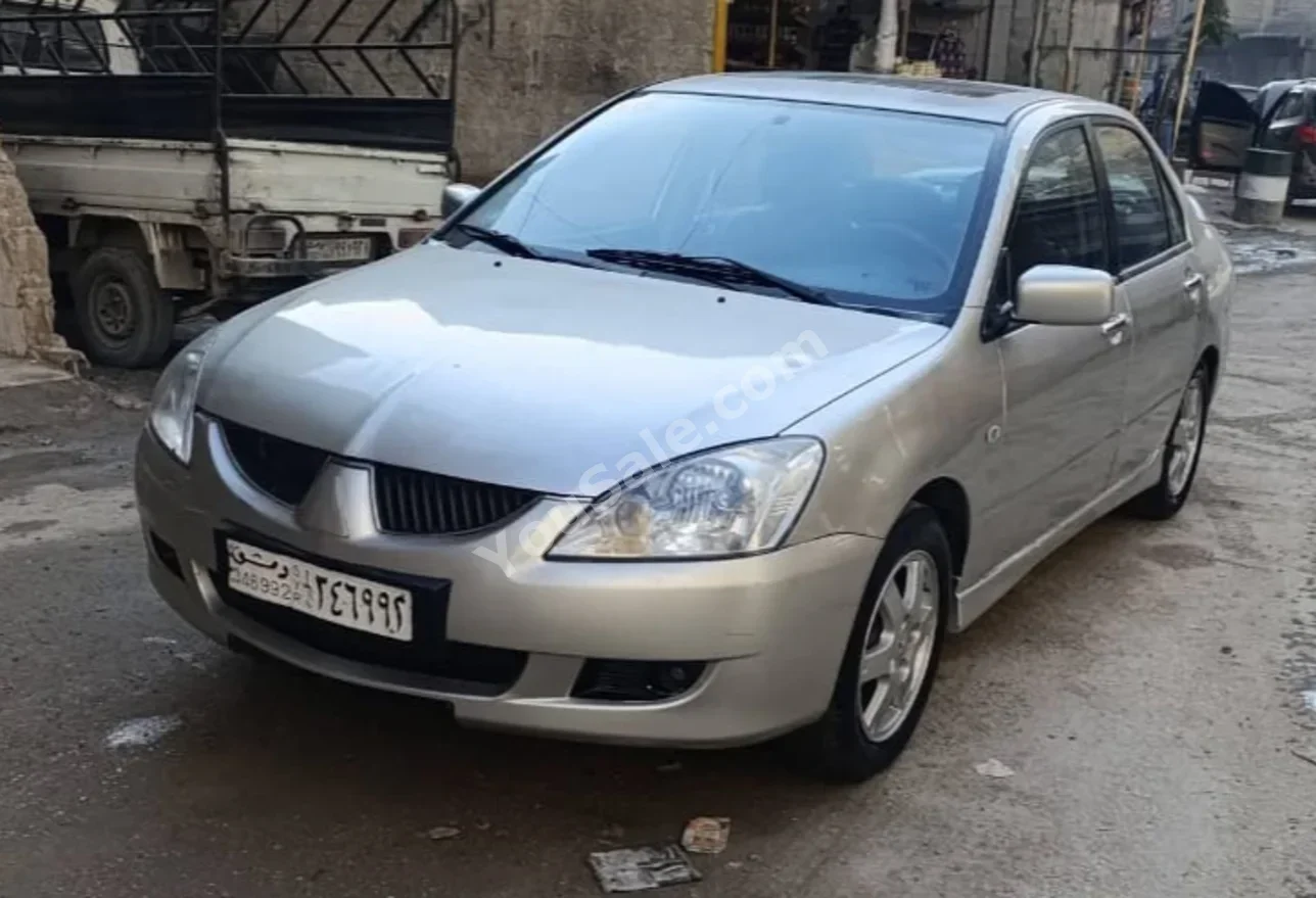 Mitsubishi Lancer 2006 Automatic 150,000 km 4 Cylinder FWD Sedan Silver Gasoline
