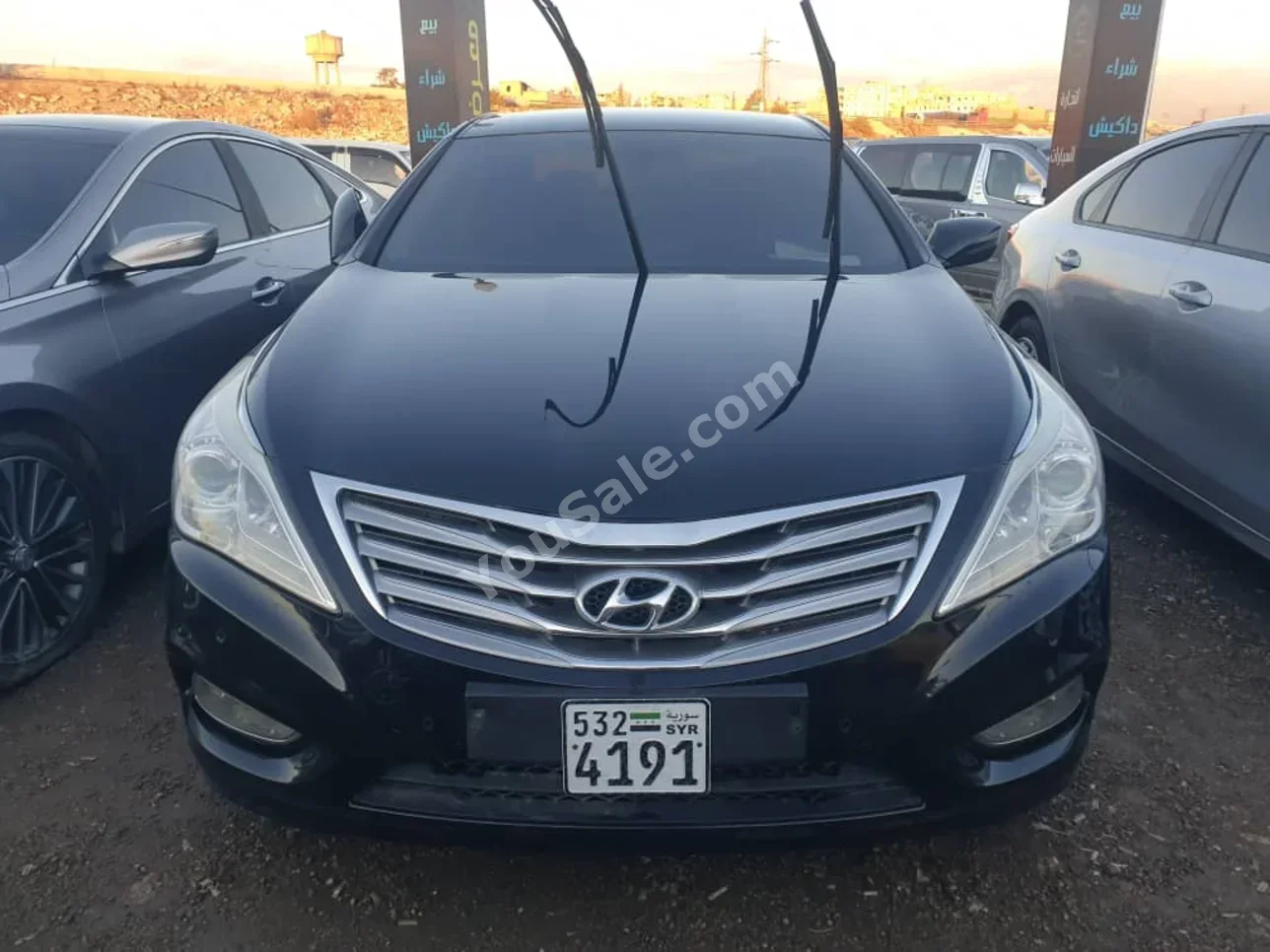 هيونداي غراندير 2012 اتوماتيك 250,000 كم 4 سلندر دفع أمامي سيدان أسود بنزين