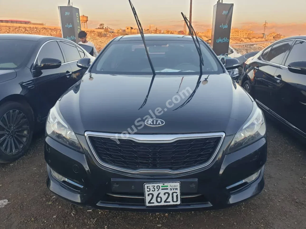 Kia  K7  2012  Automatic  99,000 km  4 Cylinder  FWD  Sedan  Black  Gasoline
