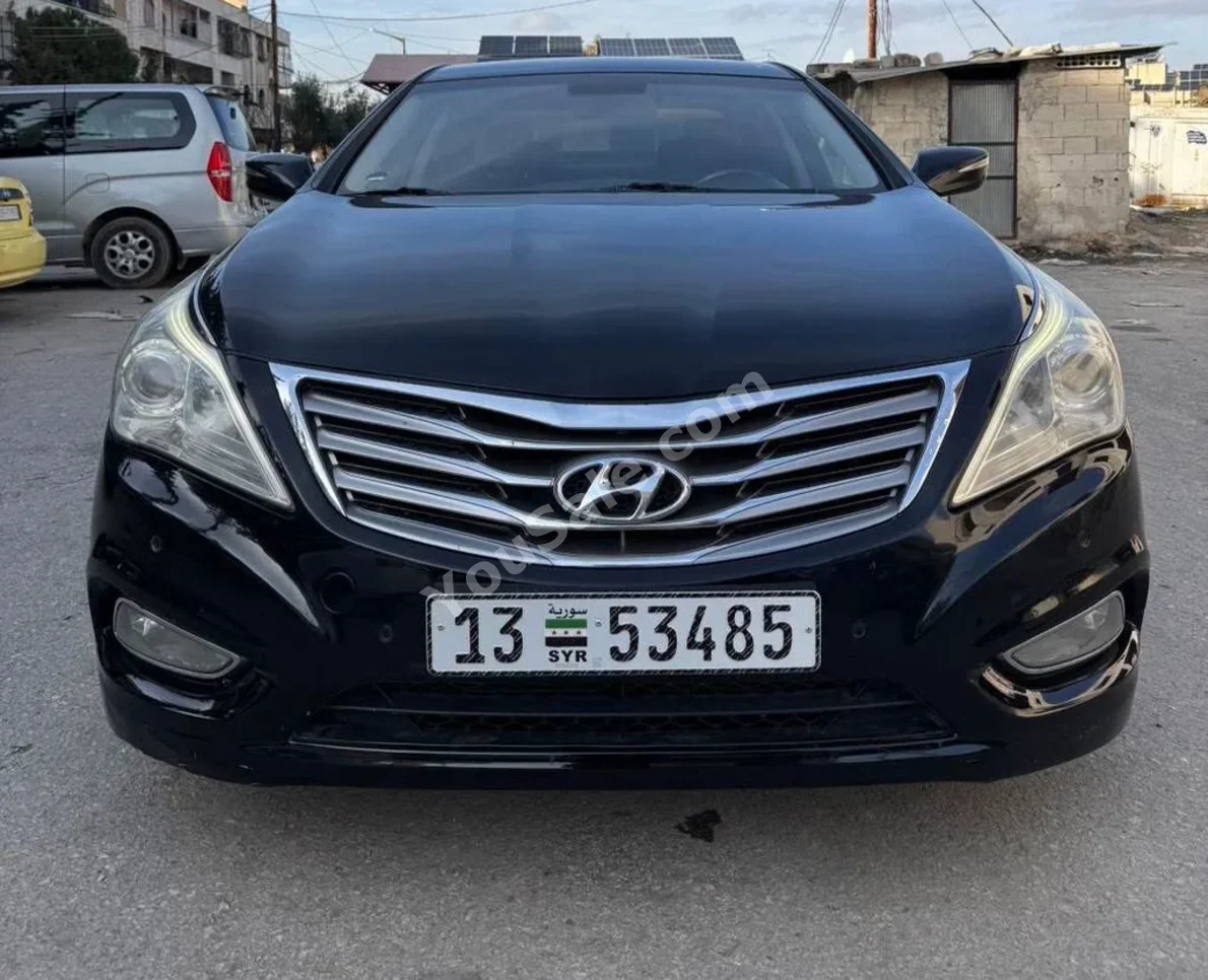 Hyundai Azera 2012 Automatic 146,000 km 4 Cylinder FWD Sedan Black Gasoline