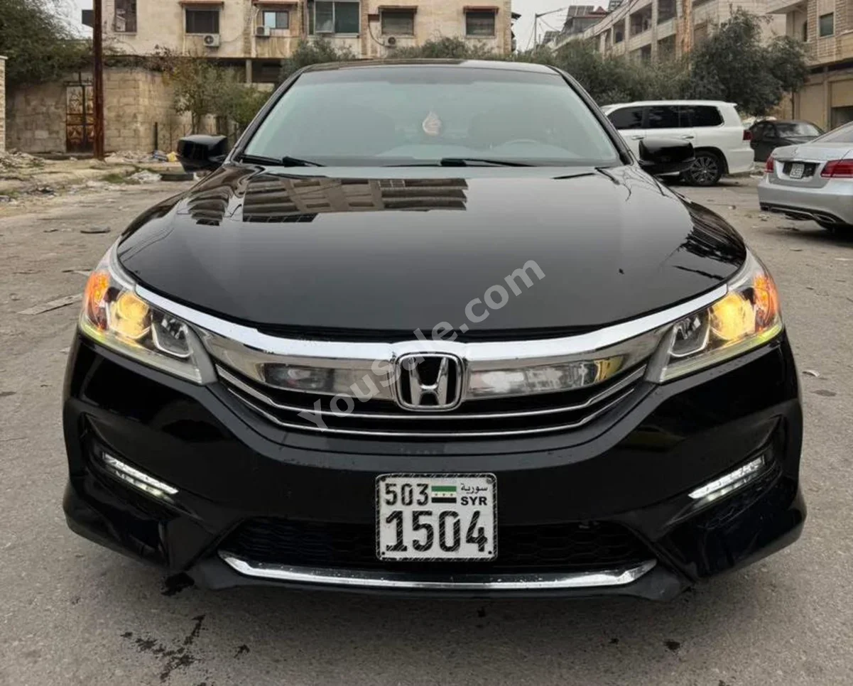 Honda  Accord  2017  Automatic  131,000 km  4 Cylinder  FWD  Sedan  Black  Gasoline
