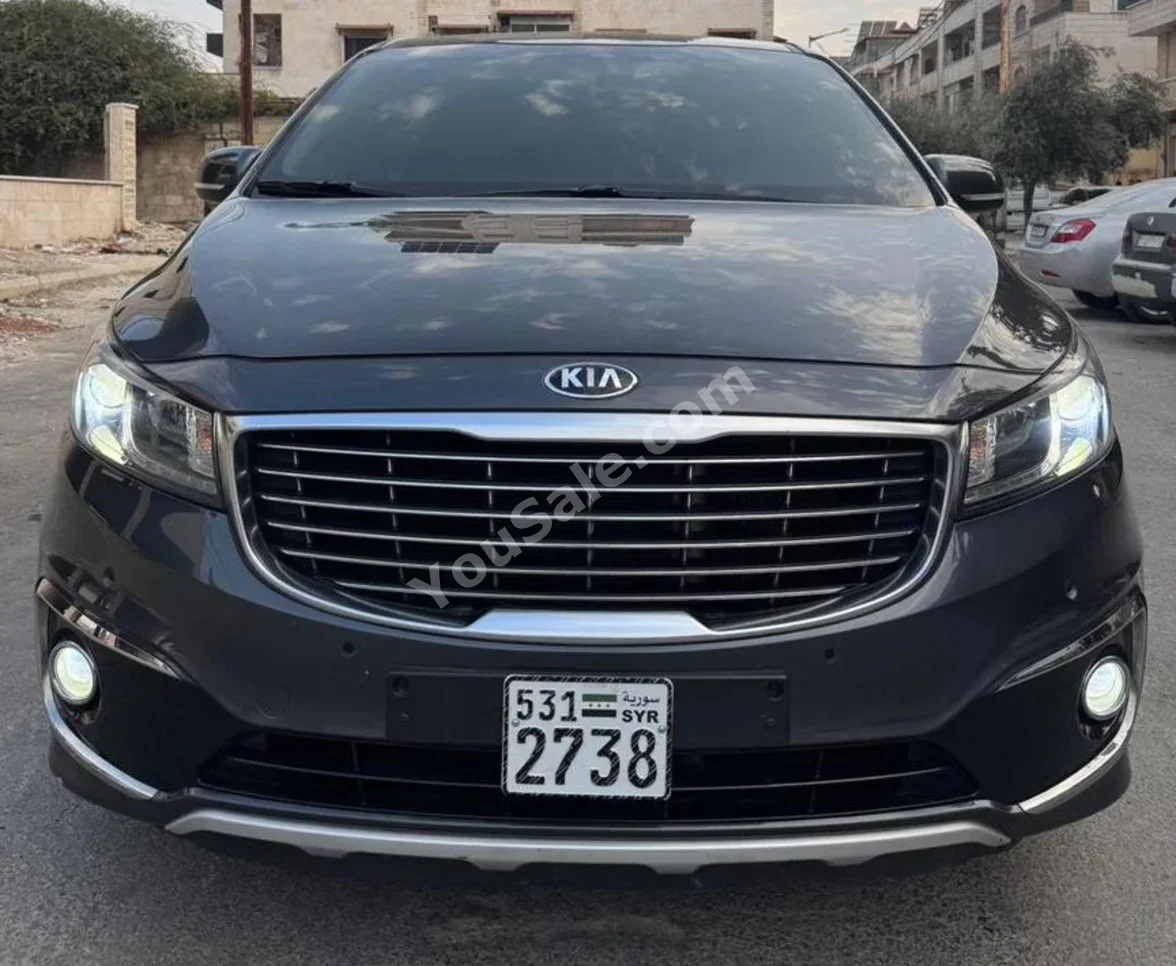 Kia  Carnival  2018  Automatic  143,000 km  4 Cylinder  AWD  Sedan  Dark Gray  Gasoline