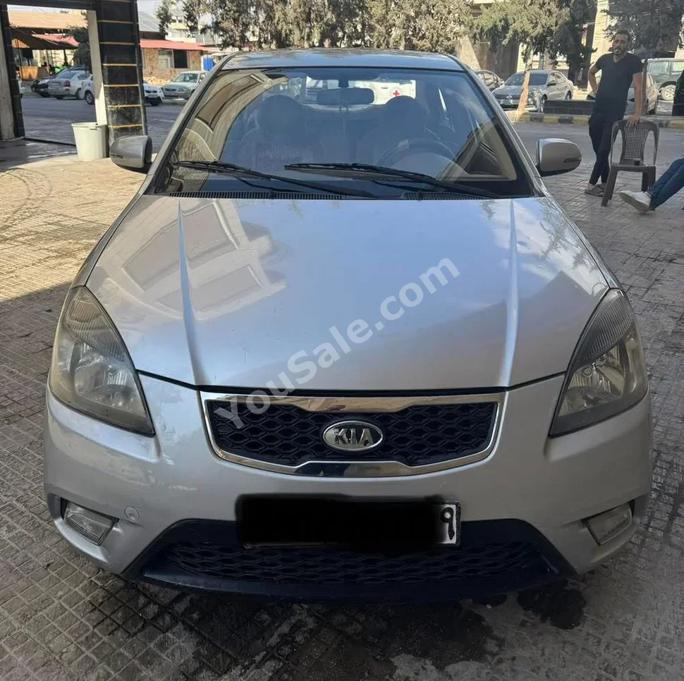 Kia Rio 2010 Automatic 70,000 km 4 Cylinder FWD Sedan Silver Gasoline