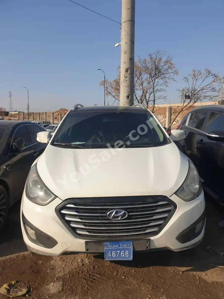 Hyundai  Tucson  2012  Automatic  195,000 km  4 Cylinder  4WD  SUV  White  Diesel