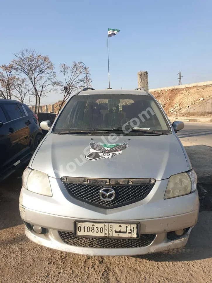 Mazda  MPV  2003  Manual  323,000 km  4 Cylinder  FWD  Van / Bus  Silver  Diesel