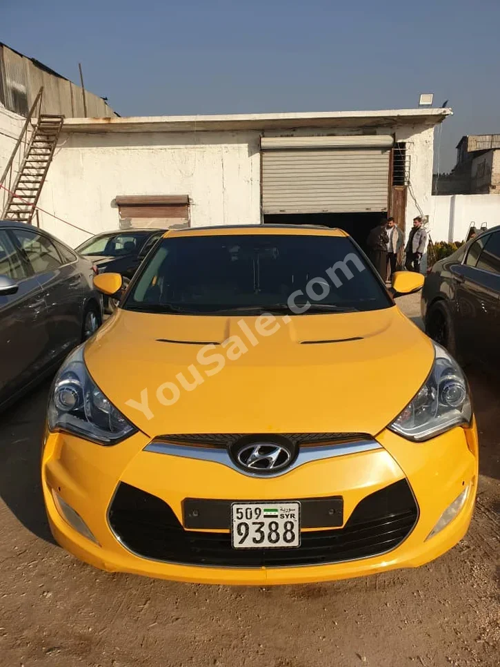 Hyundai  Veloster  2013  Automatic  122,000 km  4 Cylinder  FWD  Coupe / Sport  Yellow  Gasoline