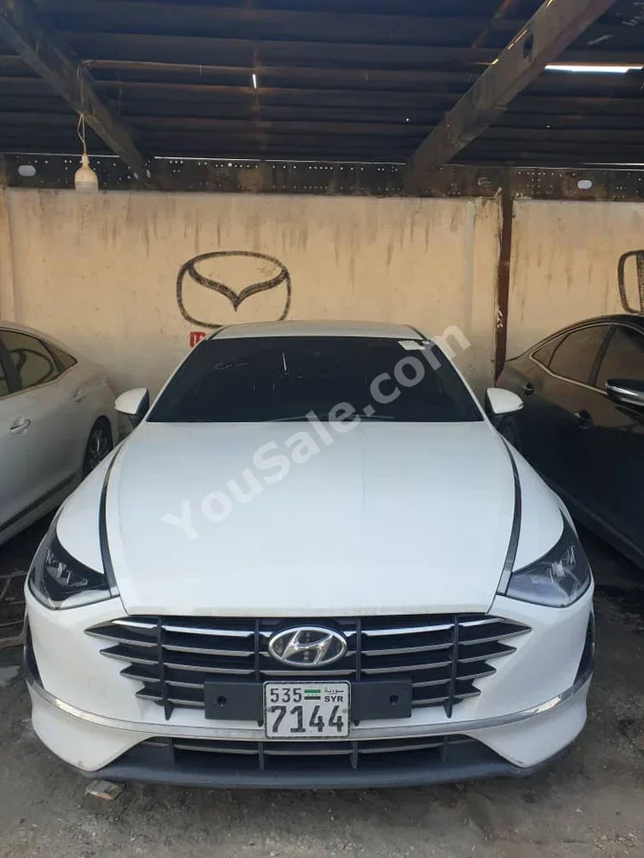 Hyundai  Sonata  2022  Automatic  168,000 km  4 Cylinder  FWD  Sedan  White  Gasoline