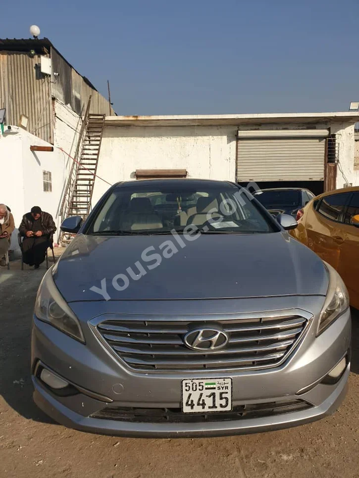 Hyundai  Sonata  2014  Automatic  116,000 km  4 Cylinder  FWD  Sedan  Silver  Gasoline