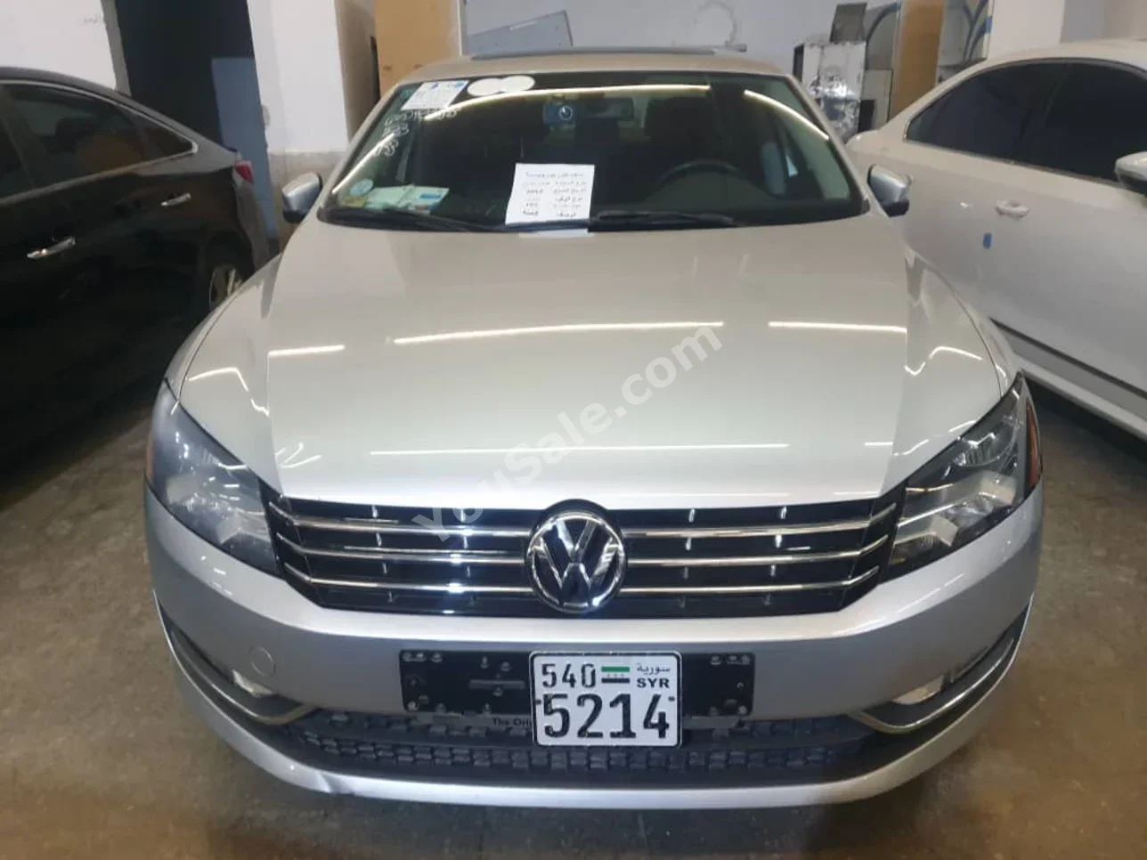 Volkswagen  Passat  2014  Automatic  165,000 km  6 Cylinder  FWD  Sedan  Silver  Gasoline