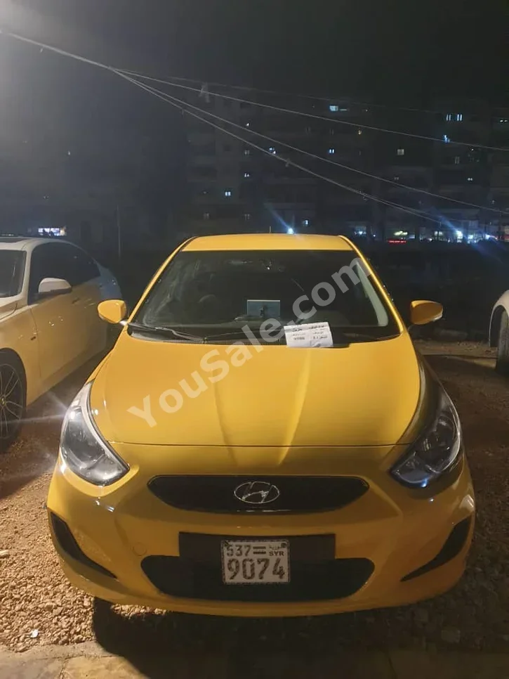 Hyundai  Accent  2019  Automatic  66,000 km  4 Cylinder  FWD  Sedan  Yellow  Gasoline