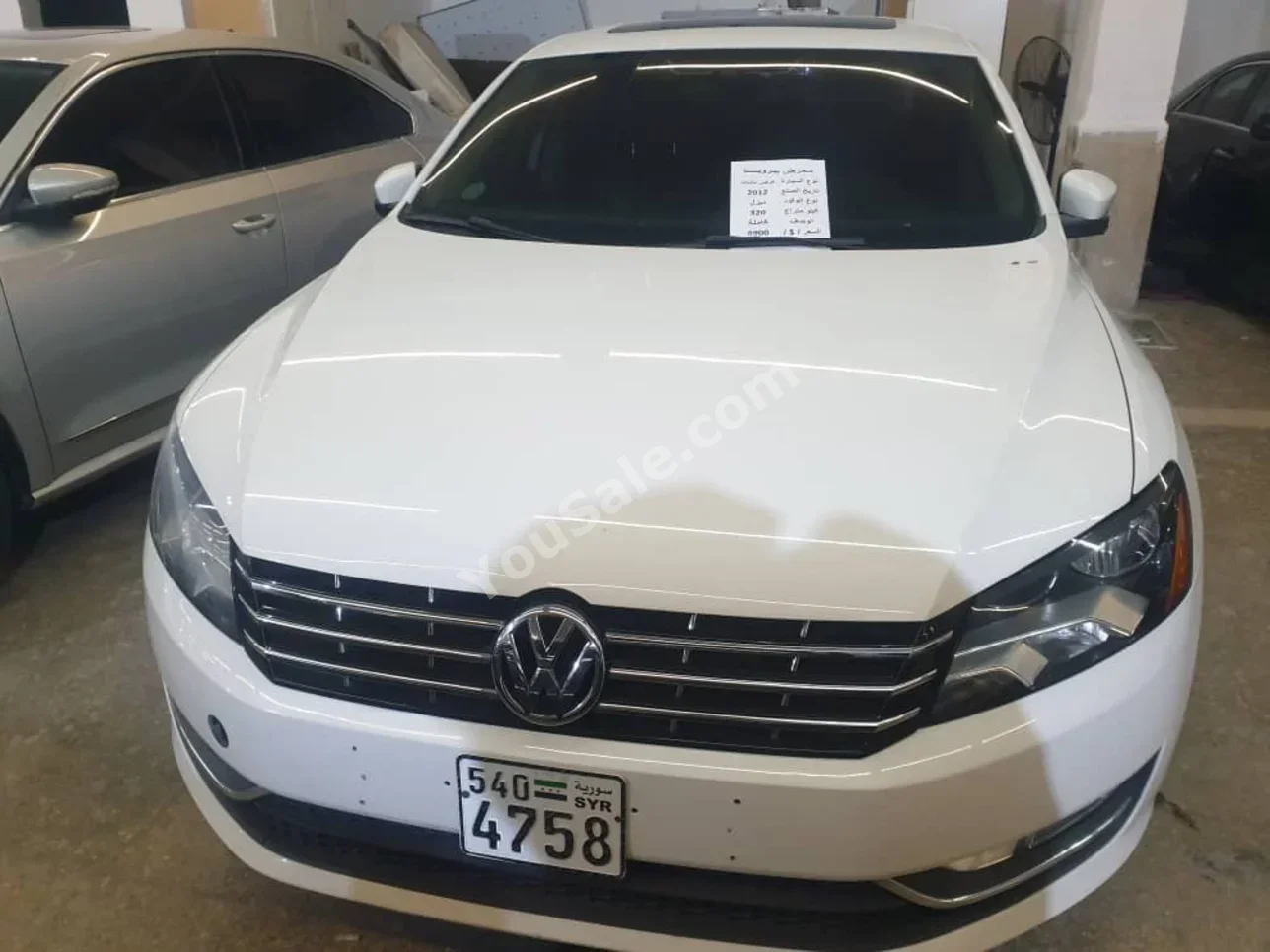Volkswagen  Passat  2012  Automatic  320,000 km  6 Cylinder  FWD  Sedan  White  Diesel