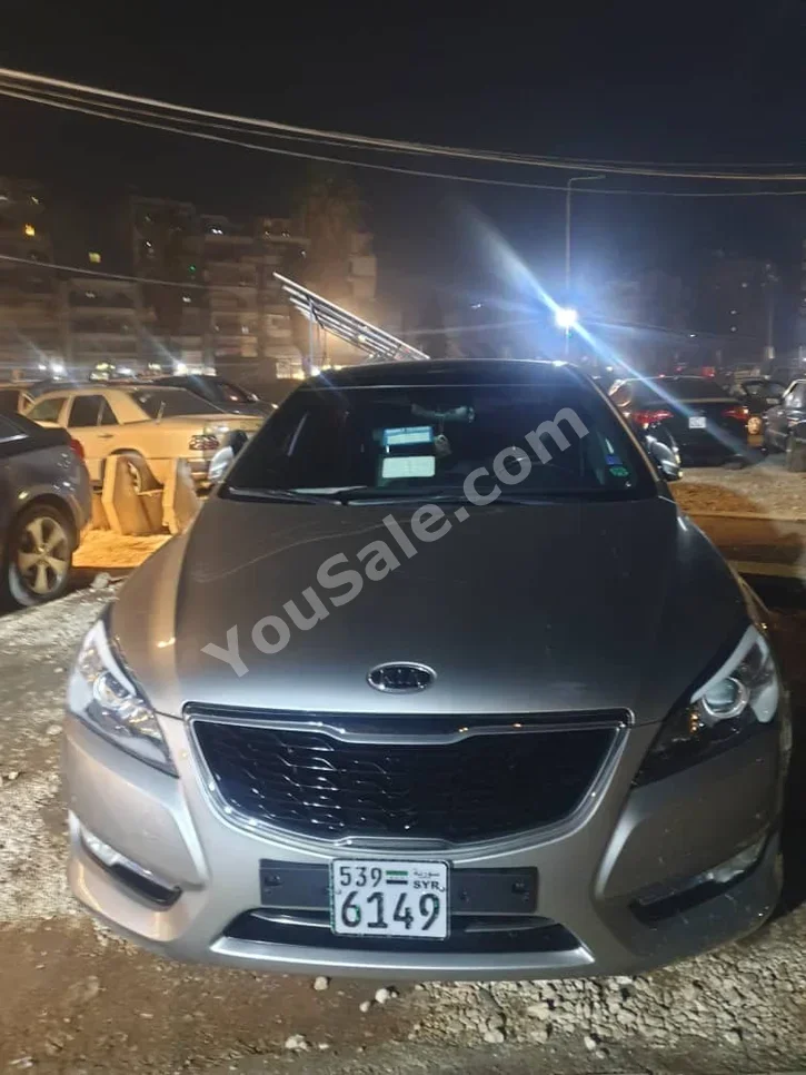 Kia  K7  2012  Automatic  103,000 km  4 Cylinder  FWD  Sedan  Silver  Gasoline