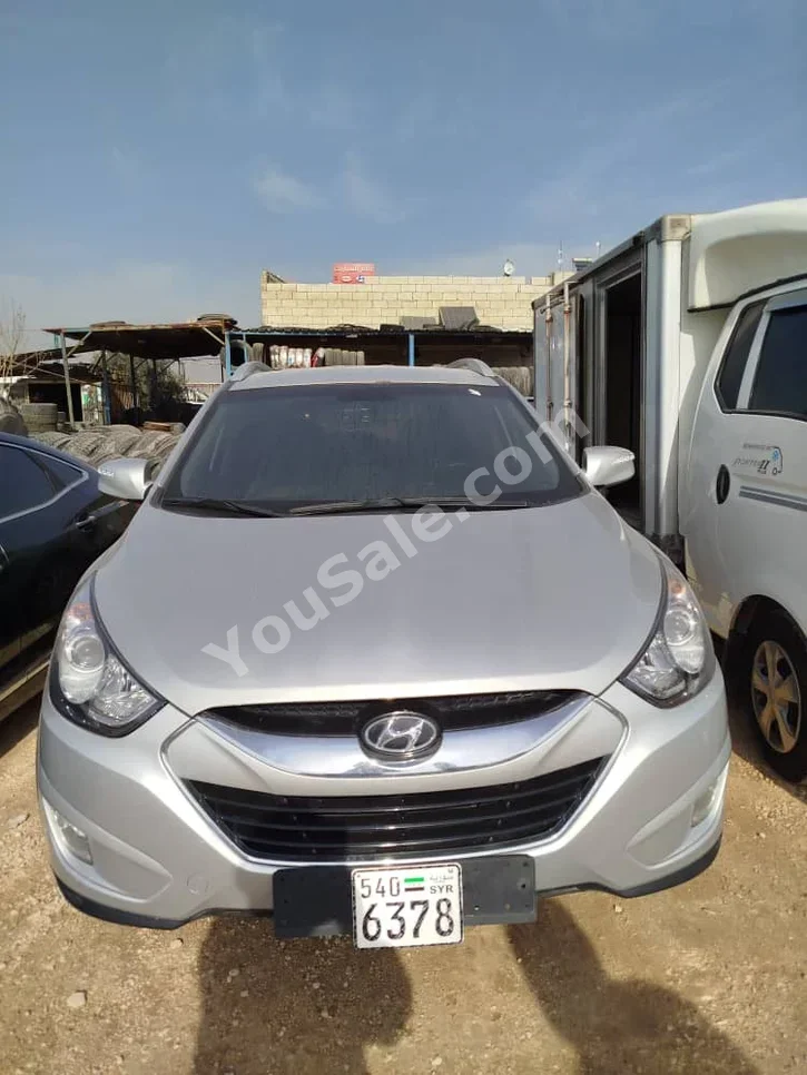 Hyundai Tucson 2011 Automatic 170,000 km 4 Cylinder FWD SUV Silver Diesel