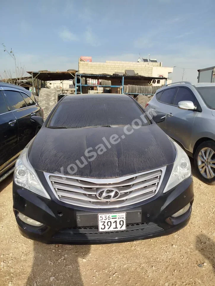 هيونداي غراندير 2012 اتوماتيك 110,000 كم 4 سلندر دفع أمامي سيدان أسود بنزين