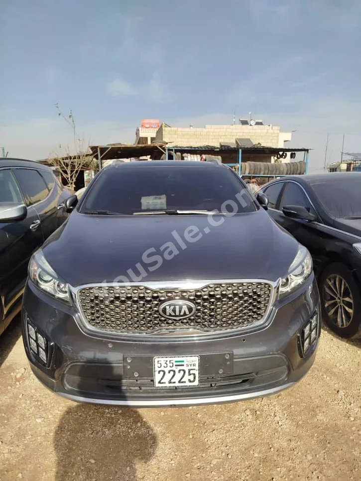 Kia  Sorento  2015  Automatic  133,000 km  4 Cylinder  FWD  SUV  Gray  Gasoline
