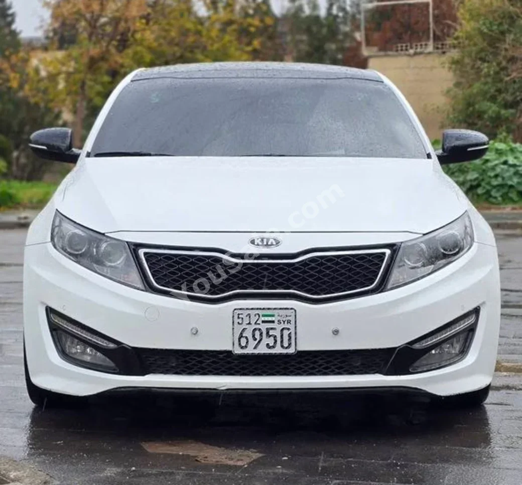 Kia  K5  2012  Automatic  152,000 km  4 Cylinder  FWD  Sedan  White  Gasoline