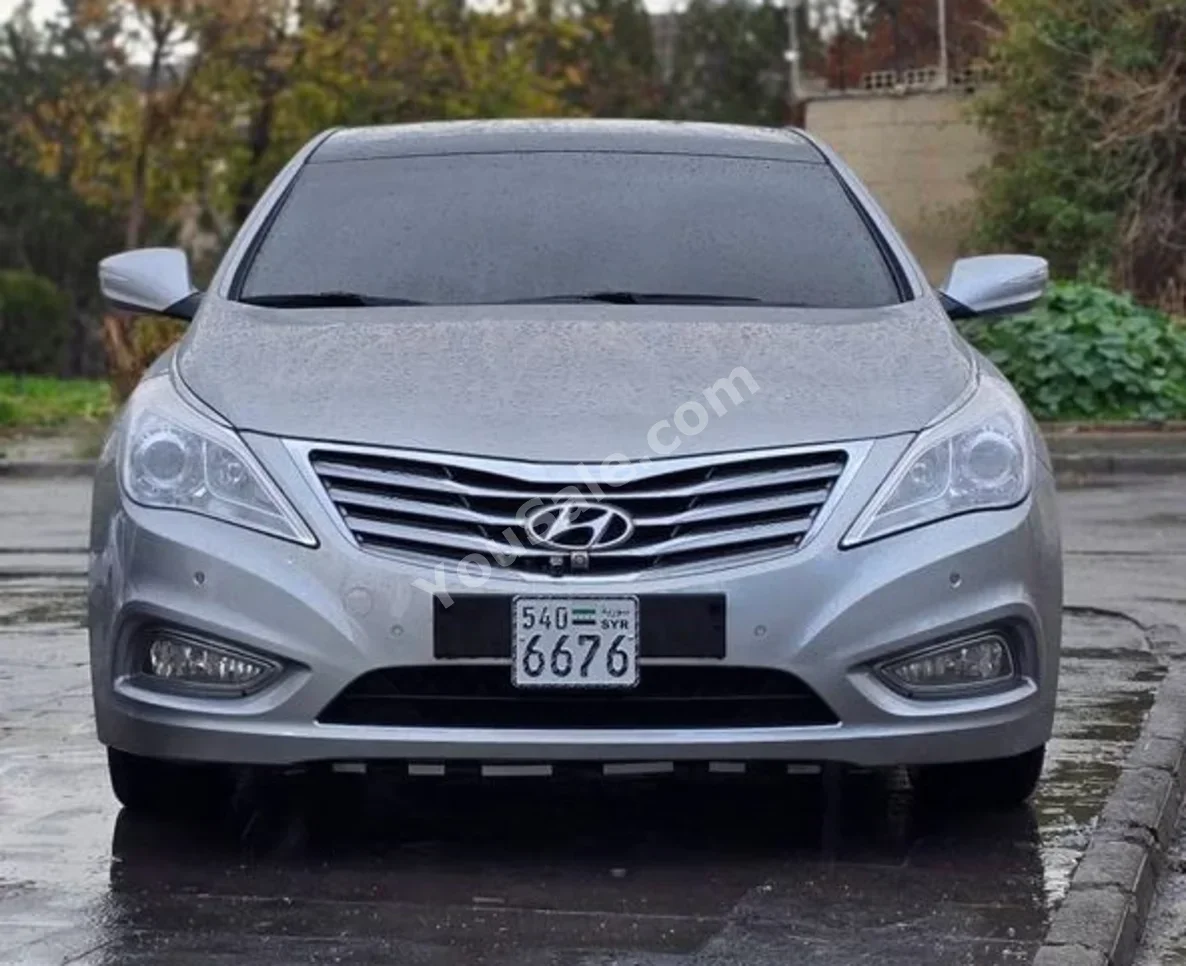 Hyundai  Azera  2011  Automatic  100,000 km  6 Cylinder  FWD  Sedan  Gray  Gasoline