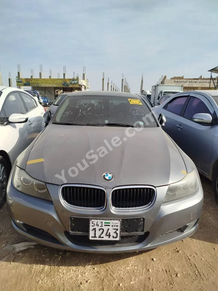 BMW  3-Series  320i  2011  Automatic  190,000 km  4 Cylinder  RWD  Sedan  Gray  Gasoline