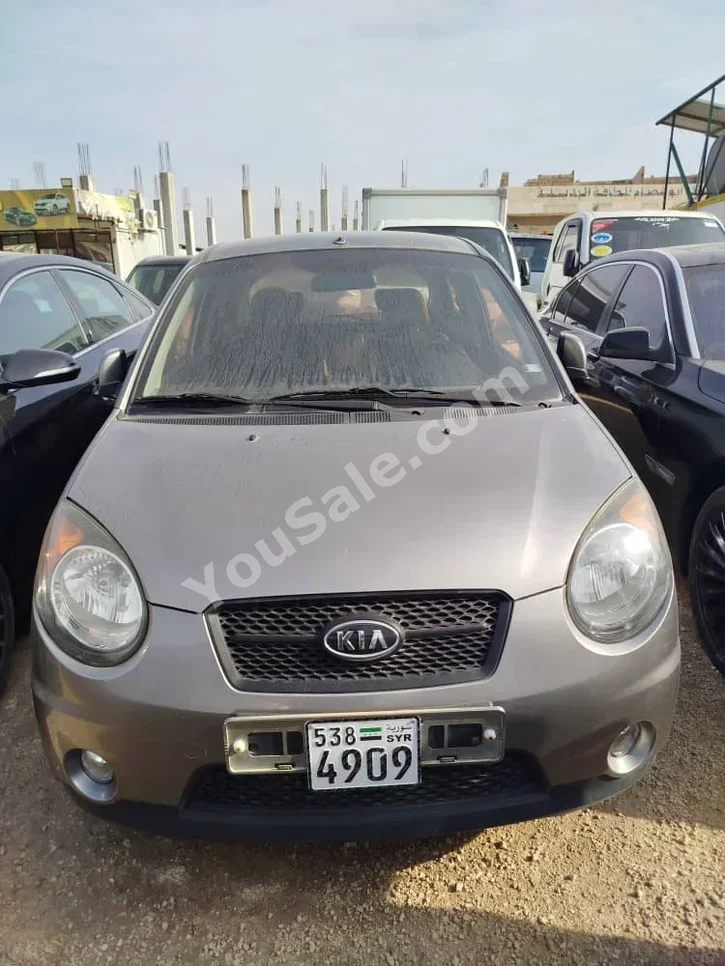 Kia  Picanto  2010  Automatic  185,000 km  4 Cylinder  FWD  Hatchback  Dark Gray  Gasoline