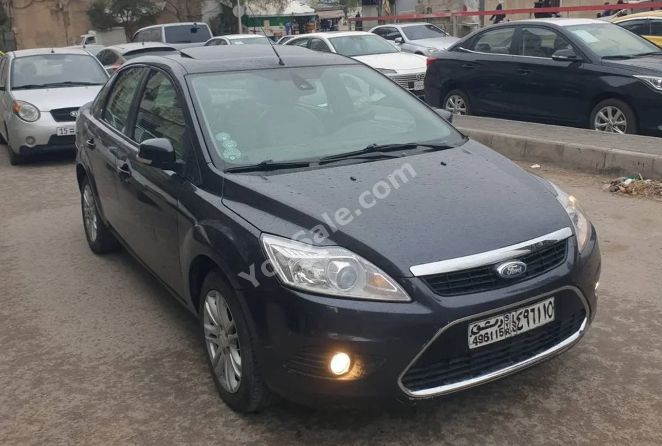 Ford  Focus  2009  Automatic  188,000 km  4 Cylinder  FWD  Sedan  Black  Gasoline