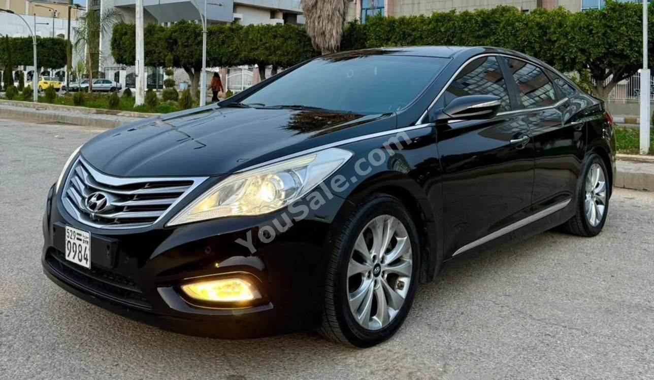 Hyundai  Azera  2012  Automatic  123,000 km  6 Cylinder  FWD  Sedan  Black  Gasoline