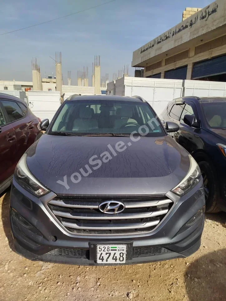 Hyundai  Tucson  2018  Automatic  130,000 km  4 Cylinder  FWD  SUV  Gray  Gasoline
