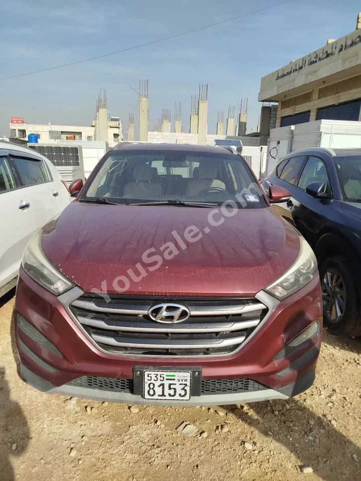 Hyundai  Tucson  2017  Automatic  120,000 km  4 Cylinder  FWD  SUV  Dark Red  Gasoline