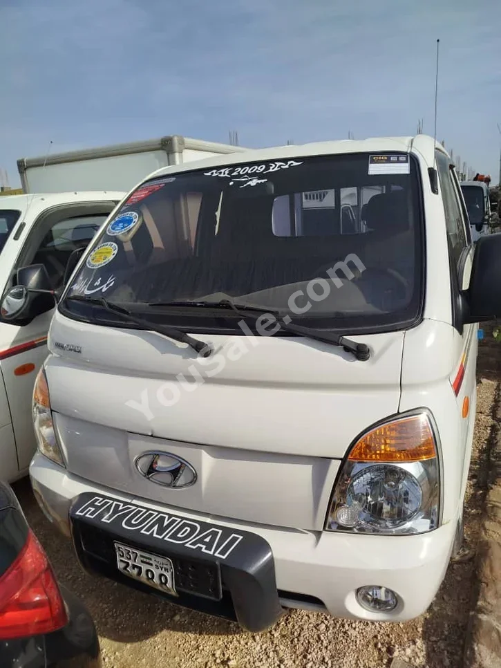 Hyundai  Porter  Porter  2009  Manual  140,000 km  4 Cylinder  RWD  Pick Up  White  Diesel