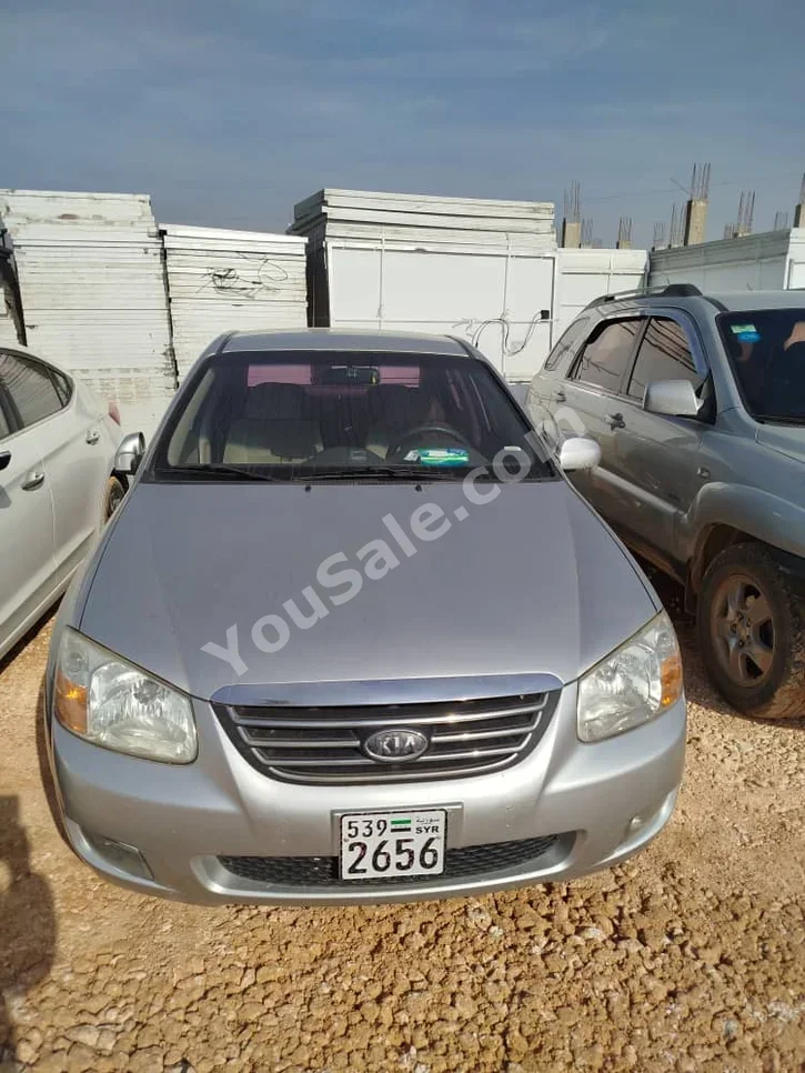 كيا سيراتو 2008 اتوماتيك 150,000 كم 4 سلندر دفع أمامي سيدان فضي بنزين