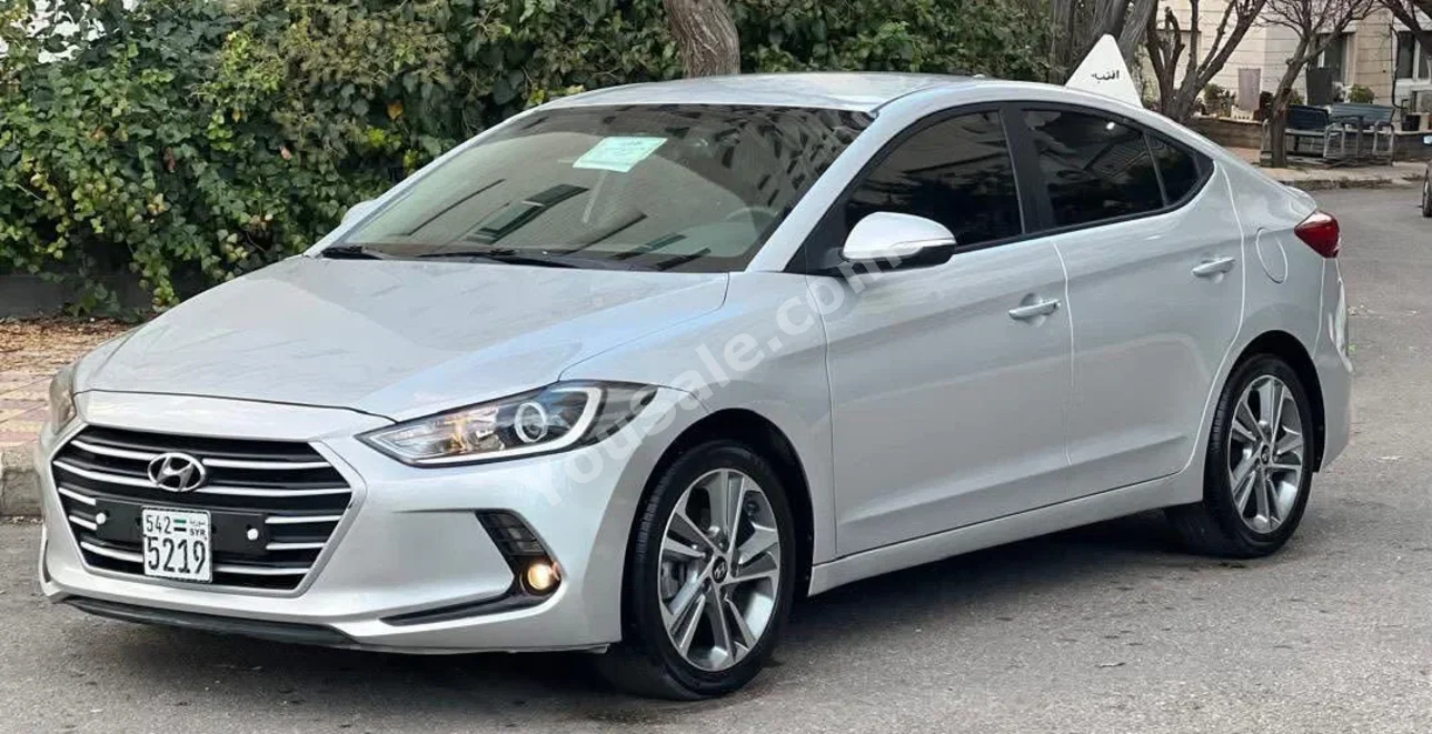 Hyundai  Avante  2018  Automatic  120,000 km  4 Cylinder  FWD  Sedan  Silver and Black  Gasoline