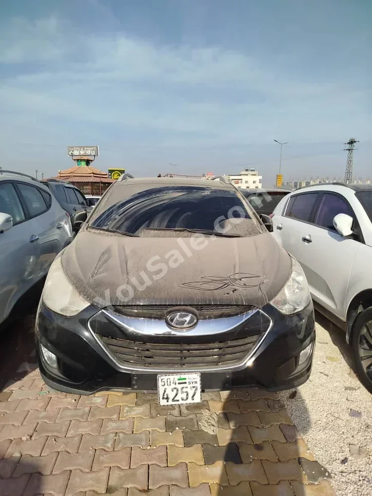 هيونداي توسان 2011 اتوماتيك 210,000 كم 4 سلندر دفع أمامي اس يو في أسود ديزل