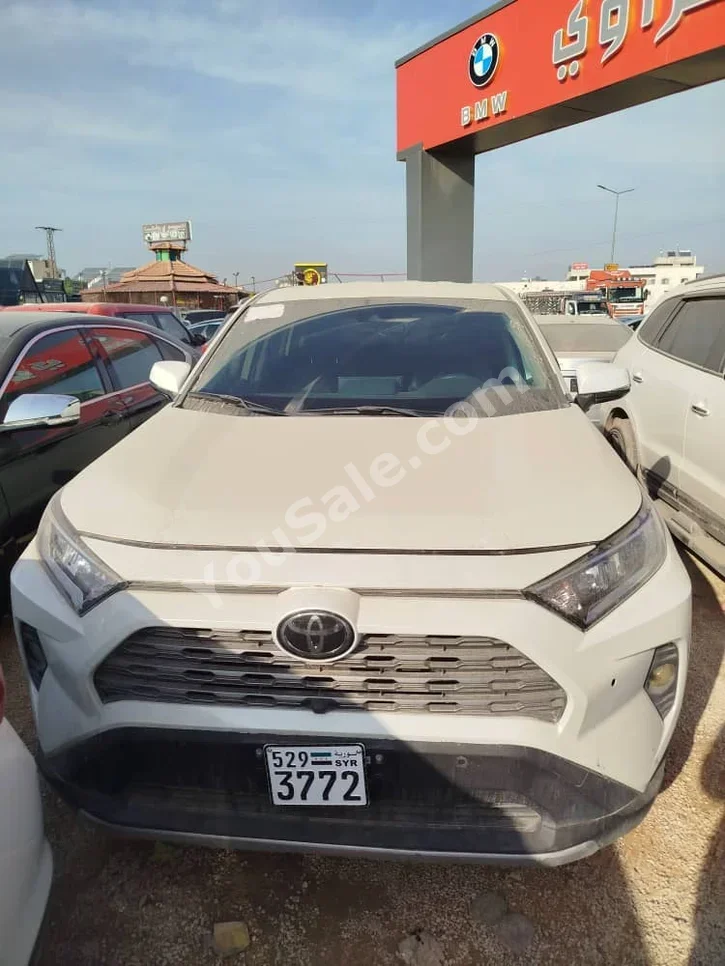Toyota  Rav 4  2019  Automatic  17,000 km  4 Cylinder  FWD  SUV  White  Gasoline