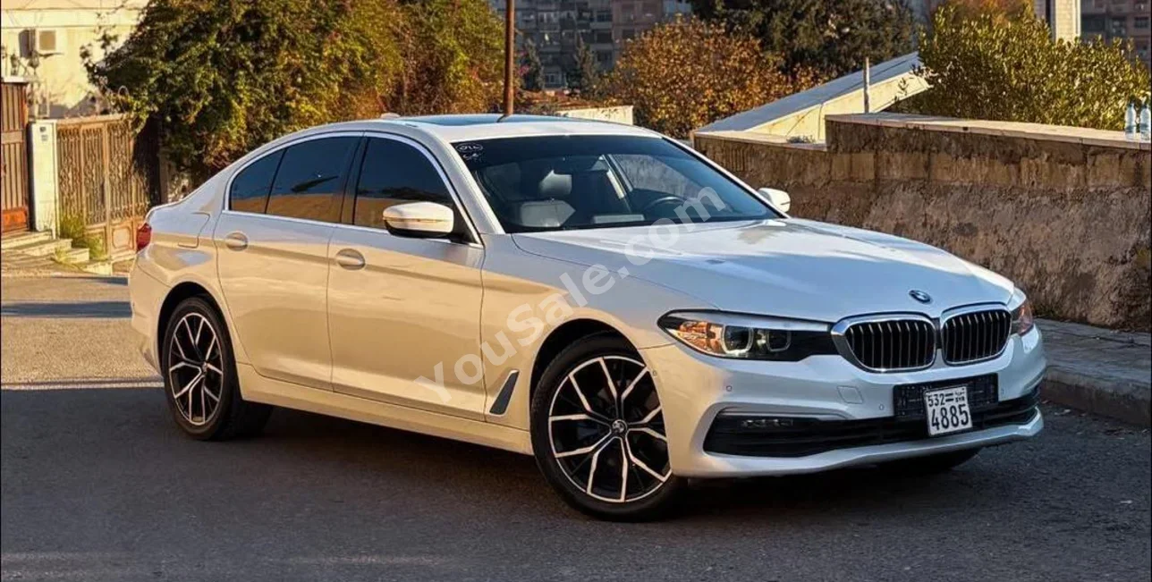 BMW 5-Series 520i 2021 Automatic 90,000 km 6 Cylinder 4WD Sedan White Gasoline