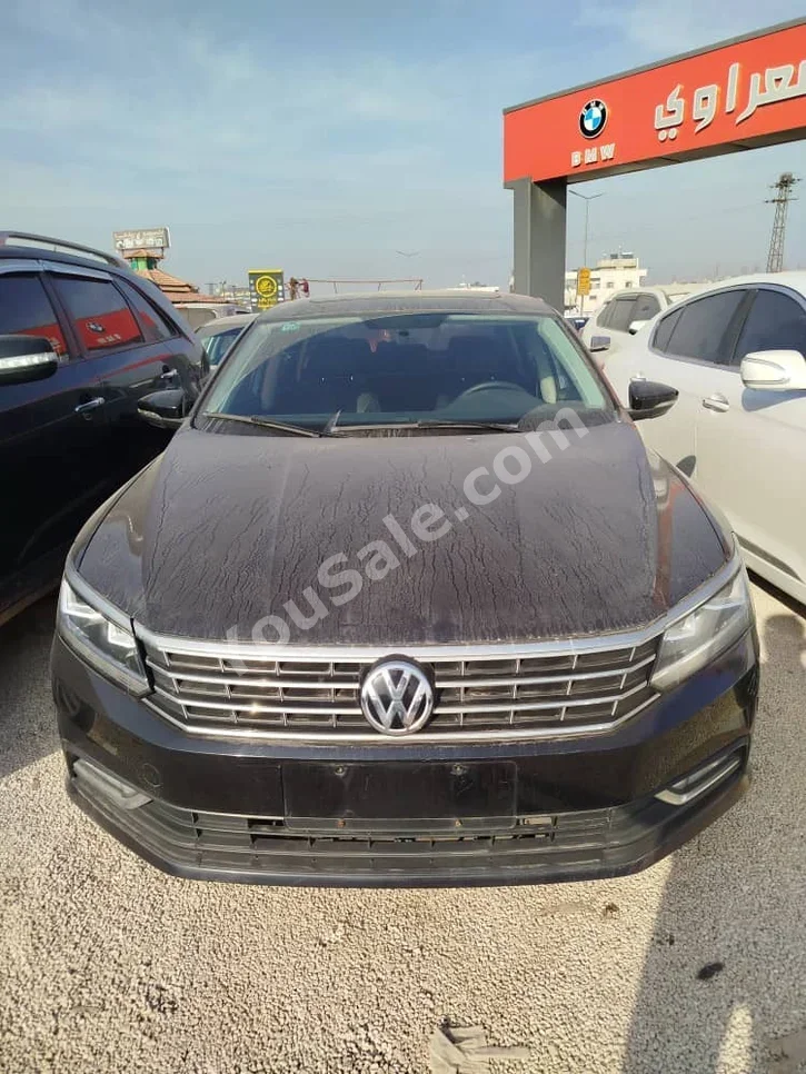 Volkswagen  Passat  2017  Automatic  133,000 km  4 Cylinder  FWD  Sedan  Black  Gasoline