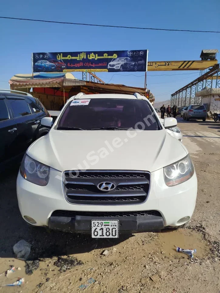 Hyundai  Santa Fe  2009  Automatic  180,000 km  4 Cylinder  FWD  SUV  White  Diesel