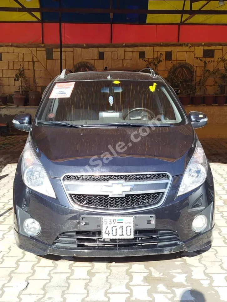 Chevrolet Spark 2011 Automatic 140,000 km 4 Cylinder FWD Hatchback Black Gasoline