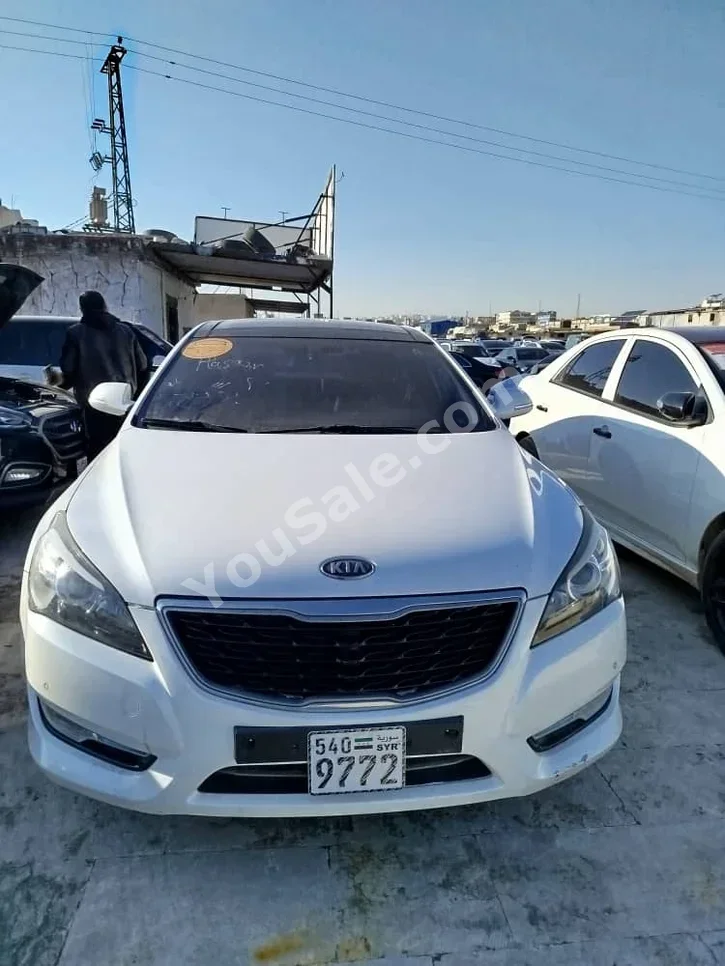 Kia  K7  2011  Automatic  160,000 km  4 Cylinder  FWD  Sedan  White  Gasoline