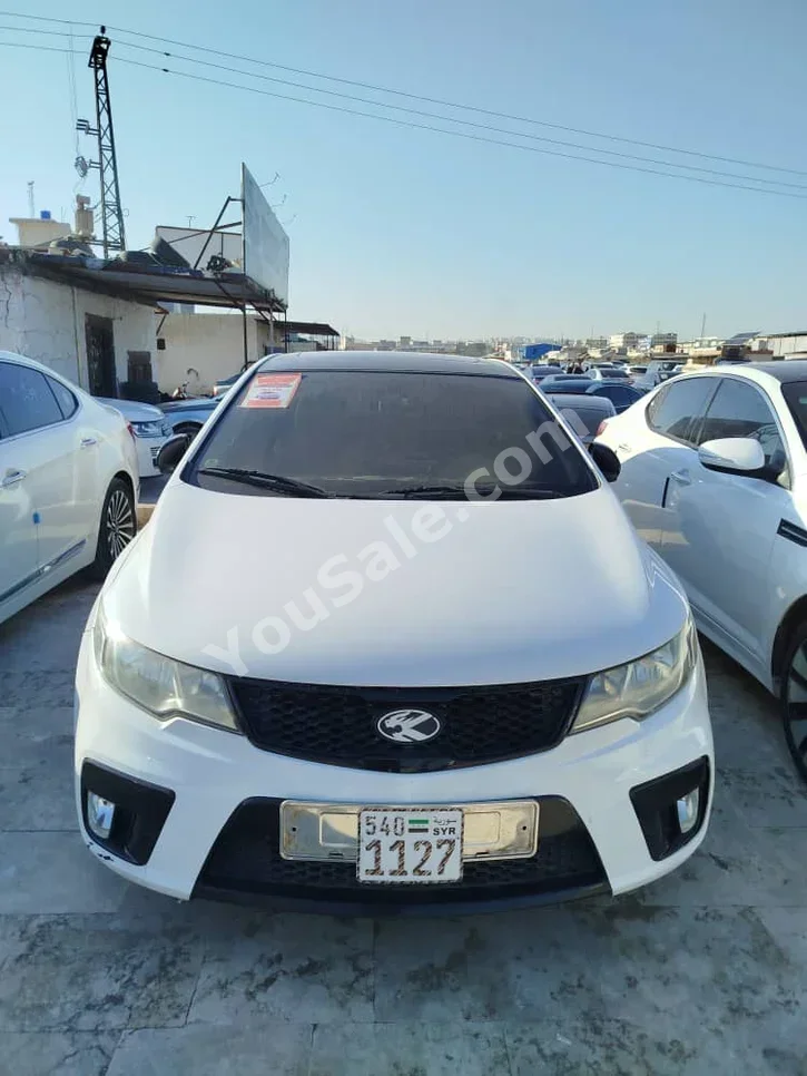 Kia Forte 2009 Automatic 187,000 km 4 Cylinder FWD Sedan White Gasoline