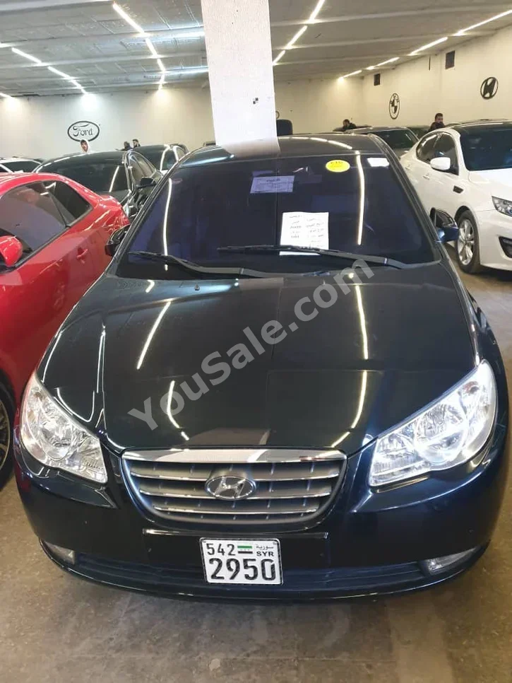 هيونداي افانتي 2009 اتوماتيك 100,000 كم 4 سلندر دفع أمامي سيدان أسود بنزين