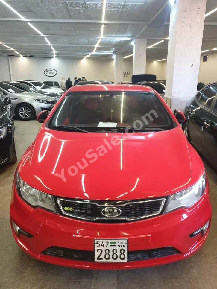 Kia  Forte  2010  Automatic  180,000 km  4 Cylinder  FWD  Coupe / Sport  Red  Gasoline