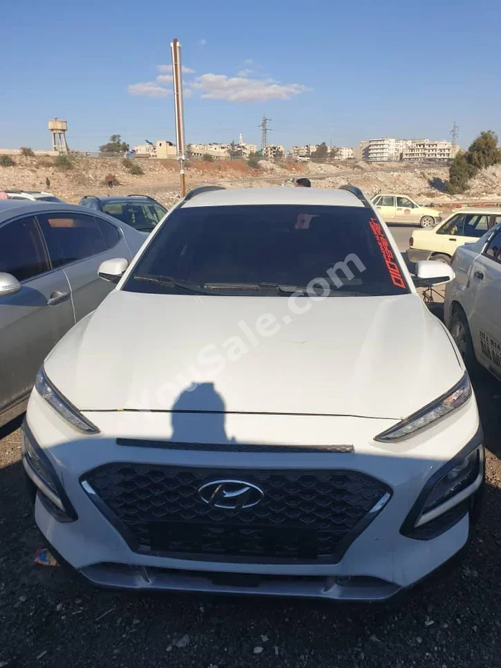 Hyundai  Kona  SE  2018  Automatic  142,000 km  4 Cylinder  FWD  SUV  White  Gasoline