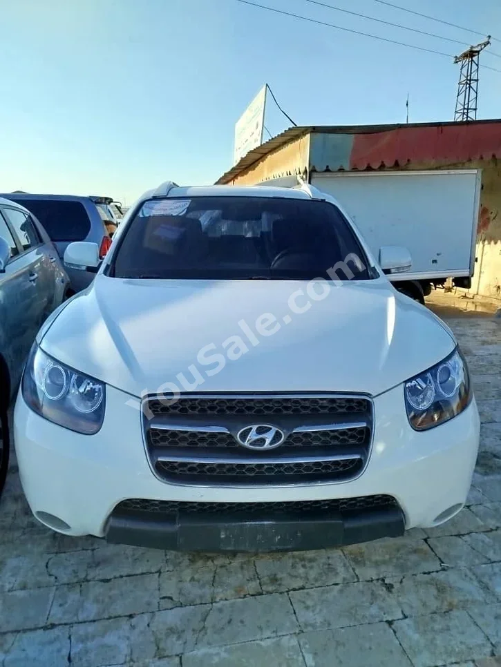 Hyundai  Santa Fe  2009  Automatic  150,000 km  4 Cylinder  FWD  SUV  White  Diesel